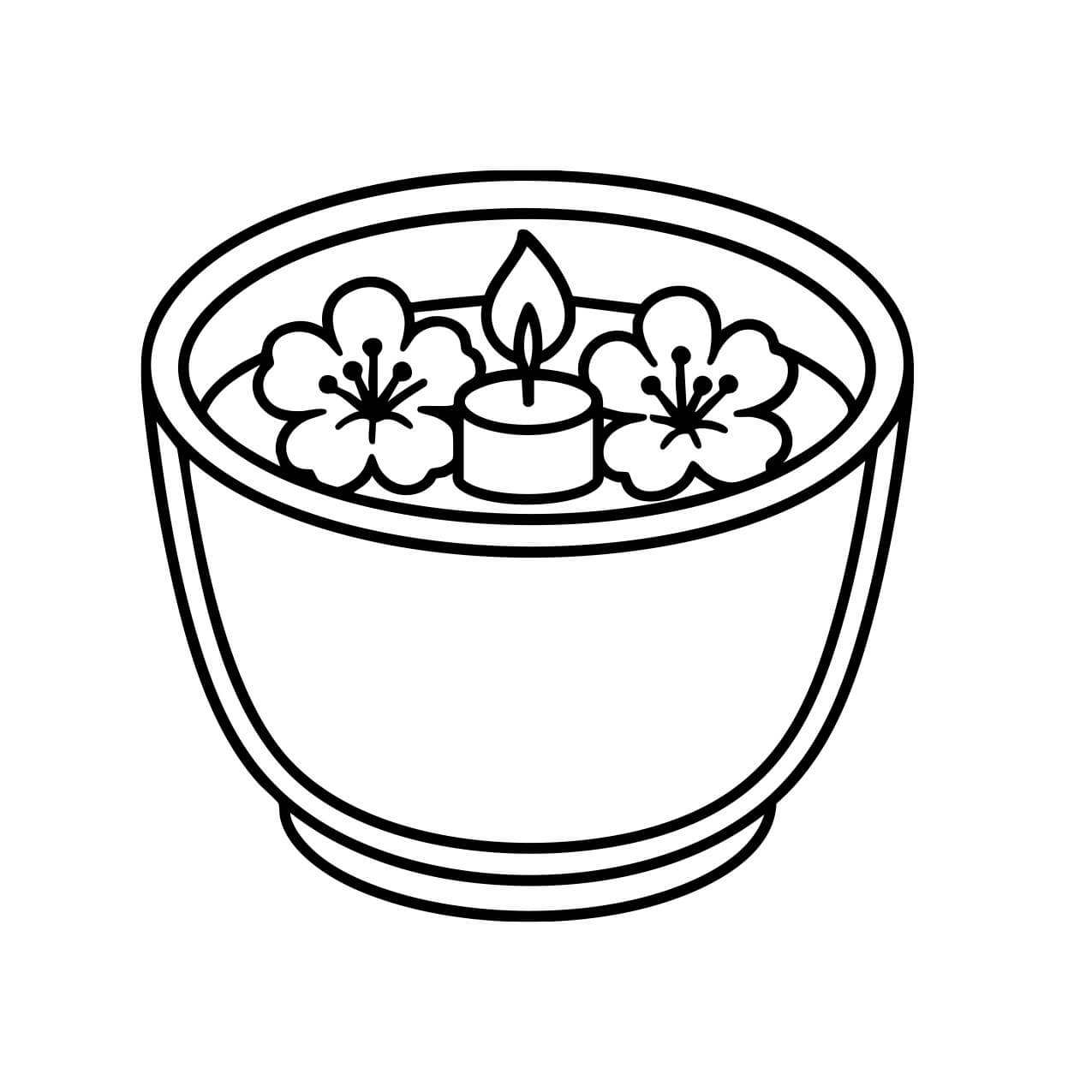 Floating candle with flowers in a round bowl